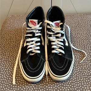 SOLD  Vans Black and White High-Top Sneakers